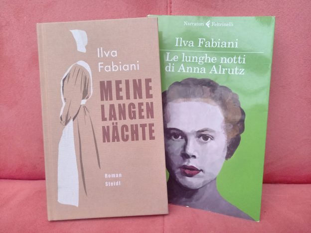 Das Cover der deutschen Ausgabe „Meine langen Nächte“ von Ilva Fabiani neben der italienischen Ausgabe „Le lunghe notti di Anna Alrutz.“